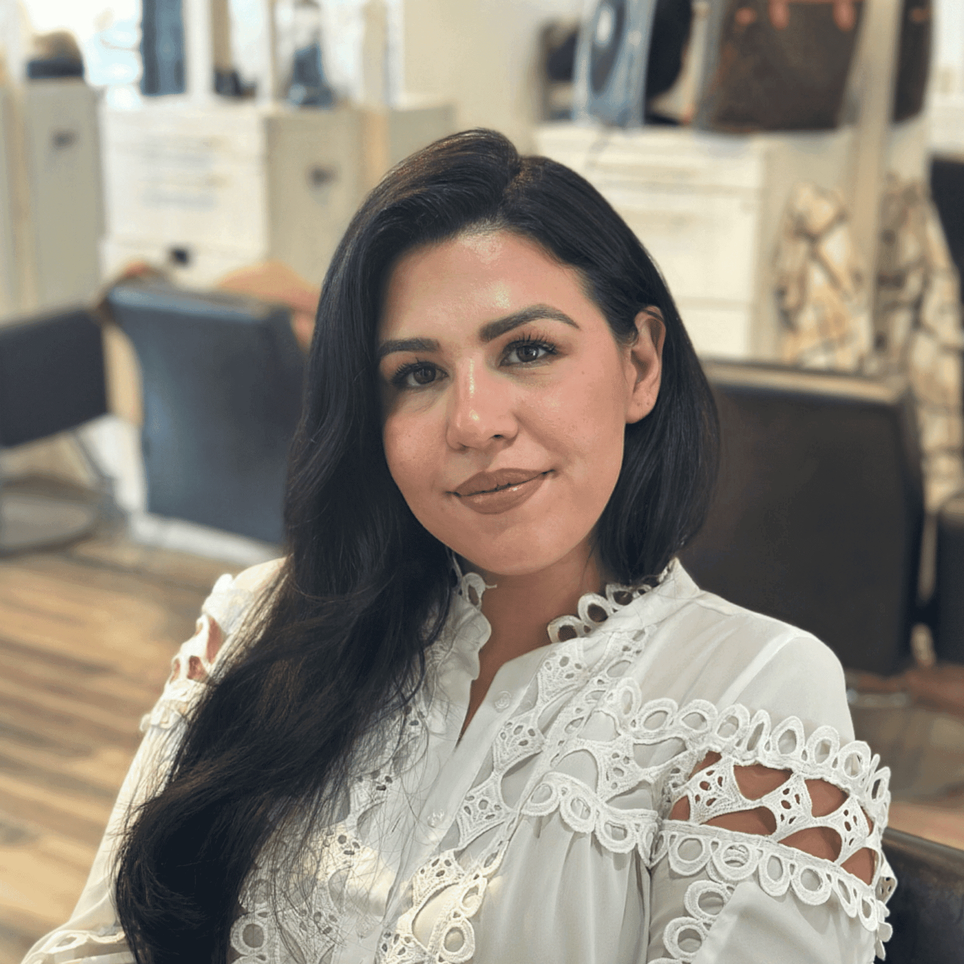 Portrait of Shqipe, a professional stylist at Panico Salon & Spa, showcasing their expertise and style.