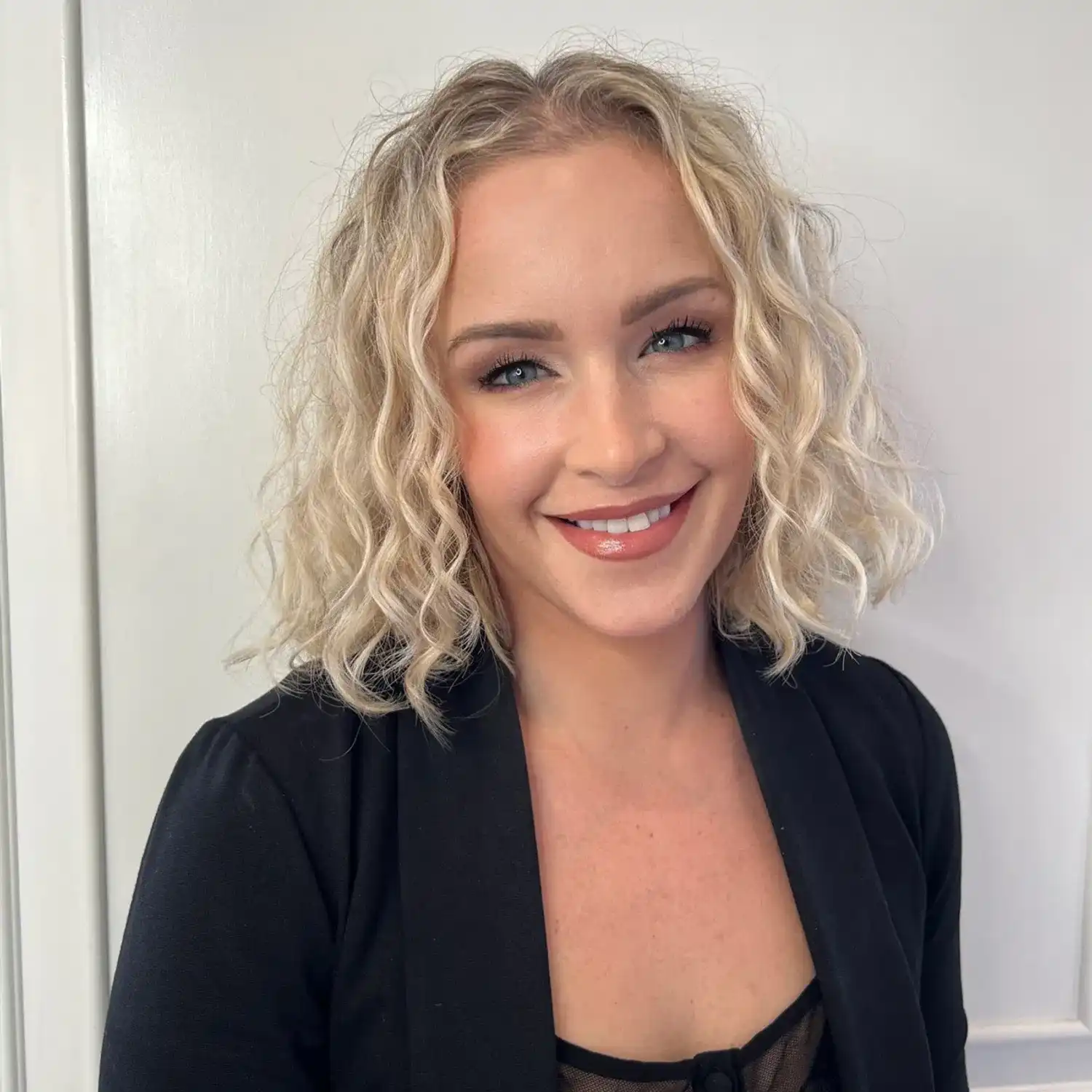 Portrait of Kelsey, a professional stylist at Panico Salon & Spa, showcasing their expertise and style.